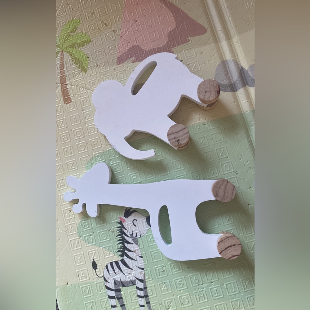 Wooden animals on wheels